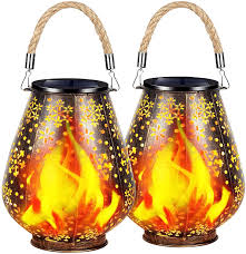 The beautiful small lamps are hanged with. Futurecitytrading Solar Lights Outdoor Flickering Flame Metal Solar Lantern Outdoor Hanging Decorative Lanterns With Durable Rope Handle Solar Powered Waterproof Decorations For Patio Garden Deck Yard Wayfair