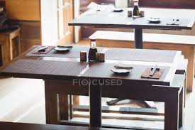 Amishoutletstore.com is the best choice for purchasing oak dining room furniture. Empty Dining Tables And Benches In Restaurant Style Salt And Pepper Shakers Stock Photo 225285980