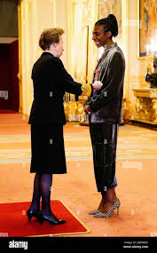 Dame Sharon White is made a Dame Commander of the British Empire by The  Princess Royal during an investiture ceremony at Windsor Castle. Picture  date: Tuesday November 30, 2021 Stock Photo 