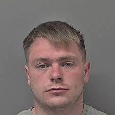 Face of yob who stabbed an innocent neighbour kissing girlfriend in the  street