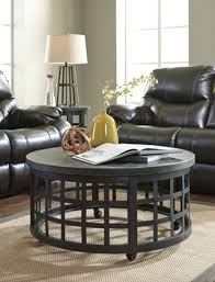 This round coffee table is crafted of reclaimed wood in a bourbon finish. Discontinued Round Cocktail Table Marimon Black Hvl Electronics Furniture
