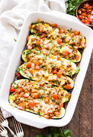 Top each with 1 tablespoon of shredded cheese. Cheesy Taco Stuffed Zucchini Boats Recipe Runner