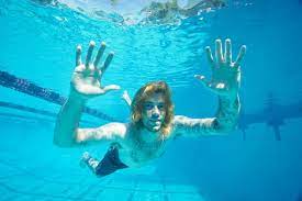 Spencer elden, now 30, is suing nirvana and record execs over the photo of him used on the cover of nevermind alleging child pornography. Vt J4rmtzlfjem