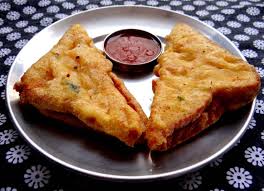 Bread Pakora Recipe Is One Of The Famous North Indian Snack Food It Is Made With Spicy Masala Blended Potatoes Coate Pakora Recipes Food Snapchat Bread Pakora