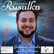 We're stoked to have #tenor Graham Brooks (he/him) back again this summer  as The Prince in #Rusalka after his hilarious performance as Pluto, god of  the Underworld, in last season's production of #