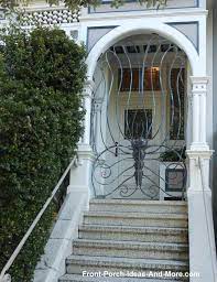 What kind of gate should i build for my front porch? Metallic Sculpture Wrought Iron Porch Gates Porch Gates San Francisco Attractions Wrought Iron Porch
