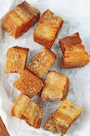 Place the cooled pork belly between two sheet pans (with cans or some weight on top) to compress the meat. Lechon Kawali Crispy Fried Pork Belly Foxy Folksy