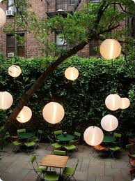 Create A Cafe Feel With Bistro Tables And Chairs And Globe Lanterns Gazebo Lighting Backyard Lighting Outdoor Lighting
