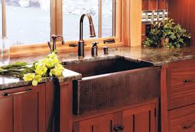 a copper farmhouse sink to a kitchen