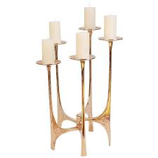 These tall tapered candle holders can hold 3 single candles. Candlesticks Candle Holder Bronze Lights Candle Lights Desk Lights Bronze Doorknobs Stand Lights Hanging Chandelier Chandeliers Win