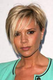 Victoria beckham rocks a lighter hair look. Victoria Beckham S Beauty Transformation Over The Years