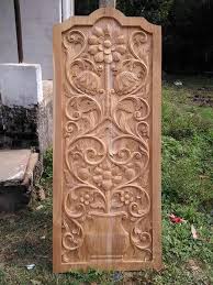 Ornamental carvings and carved architectural accents add style to cabinetry, casework, mantels, and furniture, with appliques, friezes, rosettes. Pin By Mgalvao On Carved Wood Front Door Design Wood Wooden Front Door Design Door Design Wood