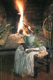 Cozy Home A Cup Of Coffee Book And Blanket In A Stool On Front Fireplace By Eduard Bonnin Casa Aconchegante Dia Do Cafe Lareira