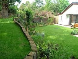 A bit of leveling the backyard will surely do the trick so yes you can level a sloped backyard but it comes with a cost and doing it on your own will prove to be tedious (and will involve a lot of sweat and labor). Garden Ideas Split Level Peter Donegan Garden Design Landscaping