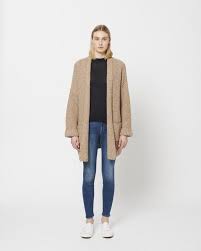 On this occasion, we are going to learn to make a knitted baby cardigan using a pattern that starts by knitting a sleeve and ending with the other one. Line Avery Knit Cardigan Birch Garmentory