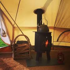 The Outbacker Hyggebell Tent Wood Burning Stove Is The Latest Addition To The Outbacker Family Allowing You To Camp Tent Stove Tent Glamping Wood Burning Stove