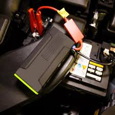 Image result for image of power bank jump starter on car