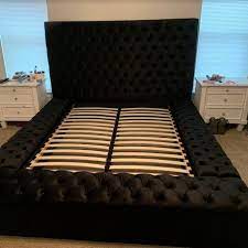 It has storage space built in. Geralyn Queen Tufted Upholstered Storage Platform Bed Upholstered Bed Frame Upholstered Storage Upholstered Beds