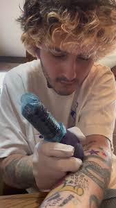 Noah Holden Tattoo No Weapon Formed