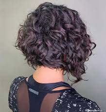 This is an asymmetrical bob haircut where the hair is cut shorter and uneven where one side is longer than the other. 50 Newest Curly Bob Hairstyles Julie Il Salon Curly Bob Hairstyles Short Curly Bob Haircut Short Curly Haircuts