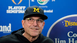 Michigan's Harbaugh sidesteps NFL coaching rumors after first practice in  California