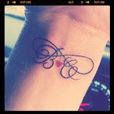 The artist can fill the font with red and black colors to create a good amount of contrast and to make the tattoo stand out. Tattoo Infinity Tattoos Tattoos Picture Tattoos