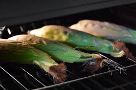Baste each cob with melted butter. Oven Roasted Corn On The Cob With The Husks The Gunny Sack