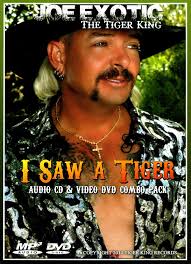 Joe exotic is giving away free condoms to children. Joe Exotic The Tiger King I Saw A Tiger Audio Cd Video Dvd Combo Pack 2013 Cd Discogs