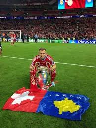 I'd tell you more about him but it's better to just wait as you'll see him in a few weeks when bayern and basel meet for the first leg of the champions league. Rilind Latifi On Twitter Xherdan Shaqiri Xs 11official Celebrates The Victory Of Bayern Munich In The Champions League With The Kosovo Flag Http T Co Bbmudubyk9