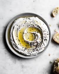 Roasted Garlic Lemon Tahini Greek Yogurt Topped With Olive Oil Sesame Seeds A Favorite Recipe Yogurt Dip Recipe Roasted Garlic Greek Yogurt Toppings