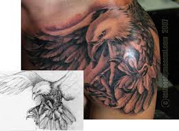 Design By Tattoo Ideas Eagles Back Tattoo Eagles Tattoo Shoulder Shoulder Tattoo Eagle Back Tattoo American Flag Sleeve Tattoo