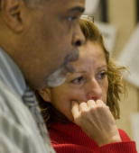 clarkk205273 Arlington, VA John Pettiford, left, helps Maria Toledo,...  News Photo