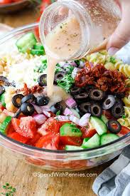 While the pasta boils, prep the cucumbers, tomatoes, red onion, olives, and feta. Mediterranean Pasta Salad Spend With Pennies