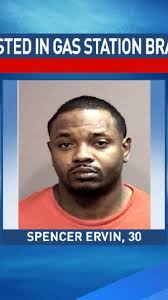 Officers attacked, 4 arrested in gas station brawl