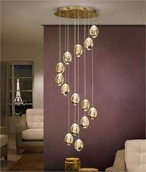 This is probably my favourite '10 of the best' so far, all of these gold ceiling lights are screaming at me to hang them in my rooms, plus i have this thing with gold/brass and all shades in between. Long Drop Multi Light Led Pendant Chrome Or Gold Led Pendant Lights Glass Ball Pendant Pendant Light