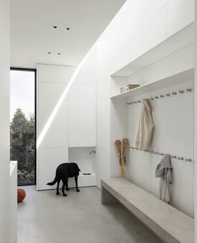 A minimalist mudroom with maximum functionality at #CadboroBayBeachHouse ⁠  ⁠ One of the goals for the home was to make it incredibly easy to live in  and maintain – concrete floors, no