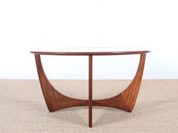 A danish modern round coffee table of excellent design by a fine cabinetmaker, in walnut, the top being inlaid with walnut in a geometric pattern with a raised edge. Mid Century Modern Danish Coffee Table By Ib Kofod Larsen Galerie Mobler