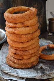 Sel Roti Is Made From A Thin Batter Of Rice Flour Mashed Bananas Sugar And Water It S Poured Into A Pot Of Hot Oil That Has A Food Nepali Food