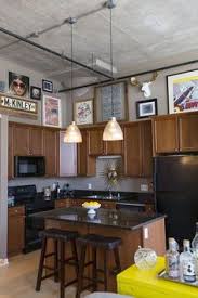 Above kitchen cabinet decor 2019. 63 Decorating Above Kitchen Cabinets Ideas Above Kitchen Cabinets Above Cabinets Decorating Above Kitchen Cabinets
