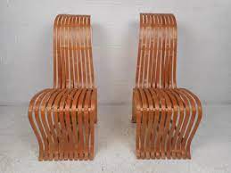 I have suspected that the chairs accommodated style at the expense of technical fortitude. Pair Of Vintage Wood Slat Chairs For Sale At 1stdibs