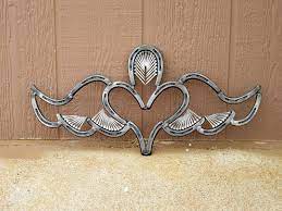 A Lady Ordered A Miniature Winged Heart For A Friend That Lives In A Camper Trailer I Used Pony Shoes For Th Horseshoe Art Horse Shoe Drawing Horseshoe Crafts