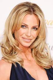 Sarah harding arrived mtv staying alive foundation dinner wearing this voluminous curly updo hairstyle. Sarah Harding S Hairstyles Hair Colors Steal Her Style