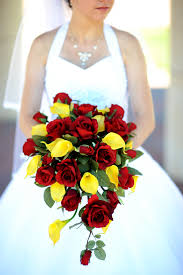 Red and yellow wedding bouquets. Red Roses And Yellow Cala Lilies Colorful Wedding Flowers Bridal Bouquet Wedding Flowers