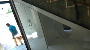 ديكور تحت الدروج مقسم من الداخل معرض مجموعة بالحاج 2 للأبواب و النوافد Pvc ودواليب المطابخ