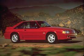 1991 Strawberry Red Ford Mustang 5 0 With Ground Effects Silver Five Star Pony Rims And Tailight Covers Fox Body Mustang Ford Mustang Ford Mustang Forum