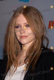 Avril lavigne 'my world' dvd+cd new! Photos And Pictures Avril Lavigne Arrives At The Release Party Of Her Dvd My World New York November 3 2003