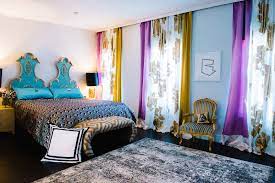 Every corner is mitered with precision, a beautiful juxtaposition to the welcoming upholstered head, footboard and side rails, button tufted in midnight blue. Cynthia Rowley S West Village Home Is Full Of Unconventional Delights Vogue