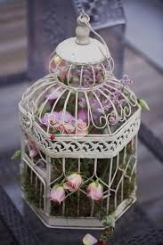 Take the second piece of wire you cut and do the same thing. Using Bird Cages For Decor 66 Beautiful Ideas Digsdigs