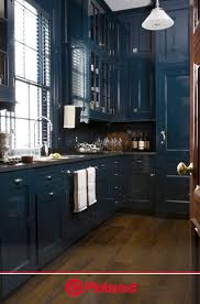 This is not inclusive of appliances, lighting or handles. Are You Gutsy Enough To Paint Your Cabinets A Bold New Color Designed W Carla Aston Dark Blue Kitchens Navy Blue Kitchen Blue Kitchen Cabinet Painless Life