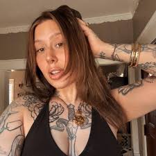 ✨ Unbothered, inked, and golden. That's the vibe.